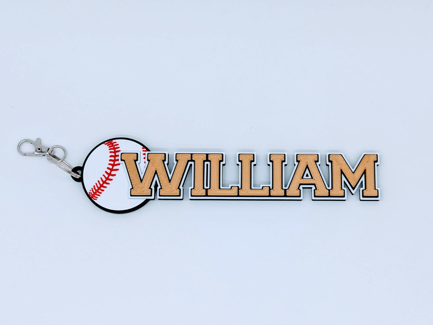Gold chic baseball bag tag made from recycled materials, with custom text.