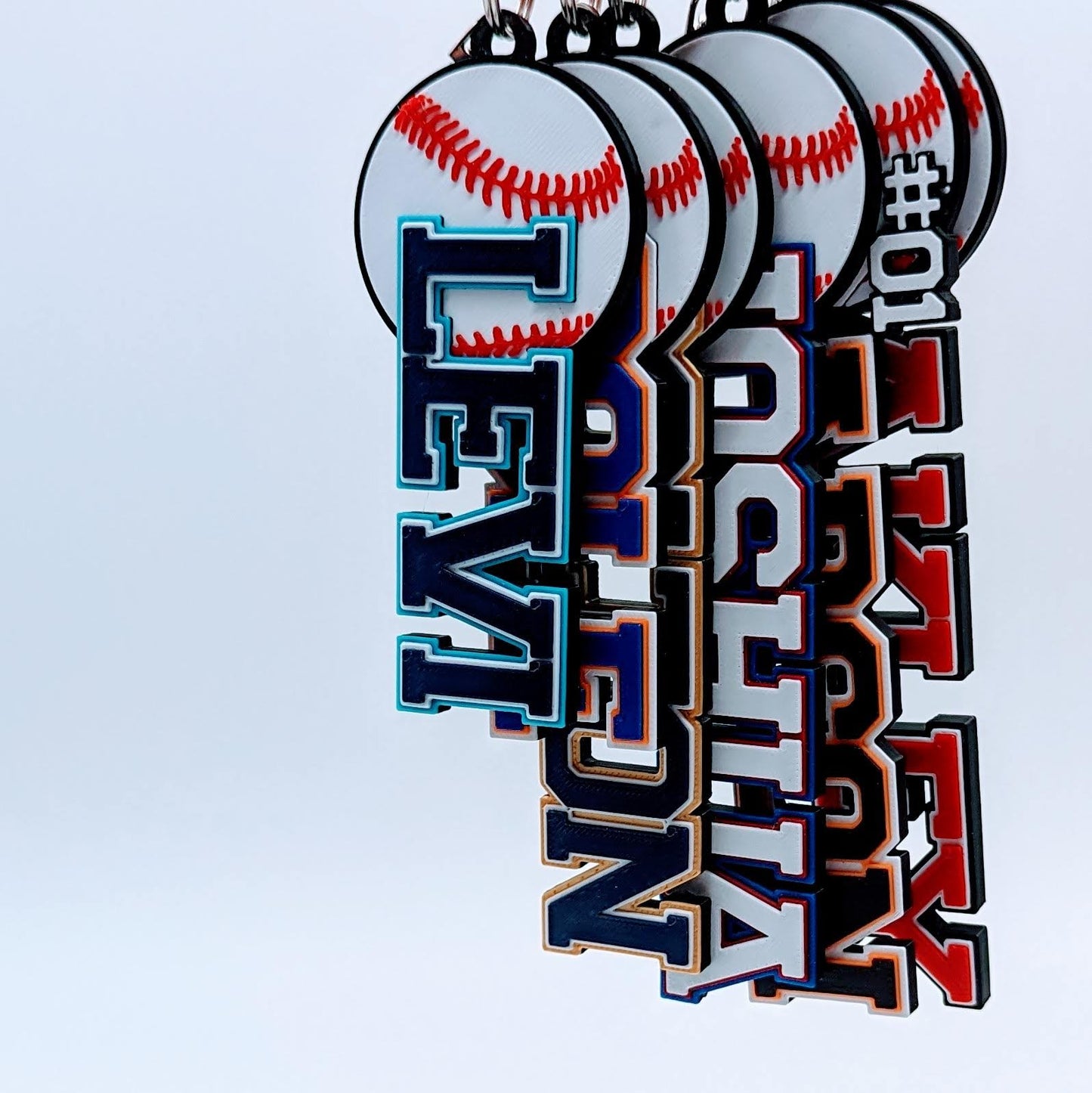 Customizable baseball bag tag featuring team logo and player name on a durable, vibrant background. Ideal for personalizing sports equipment