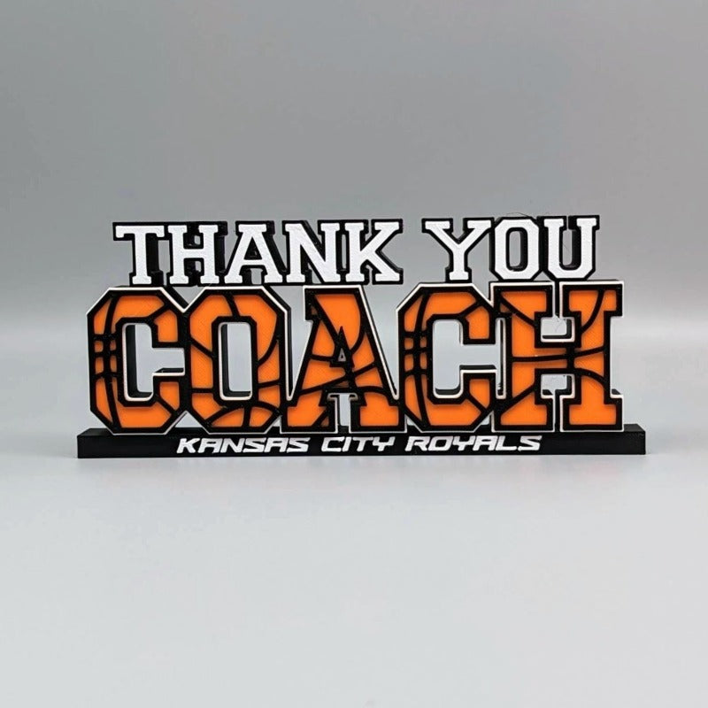 Coach gifts basketball awards