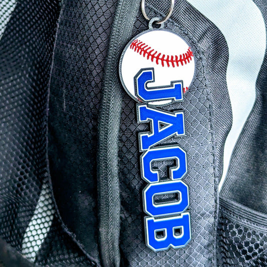 Sleek, round baseball bag tag featuring a detailed baseball stitch design, personalized for team identity.